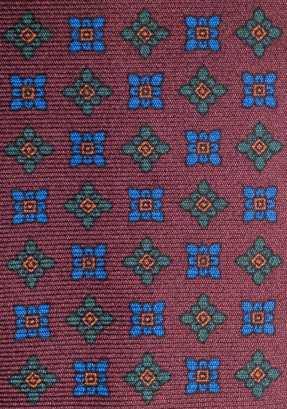 Corbata de Seda Ancient Madder Burdeos con Micropatrón Floral Geométrico